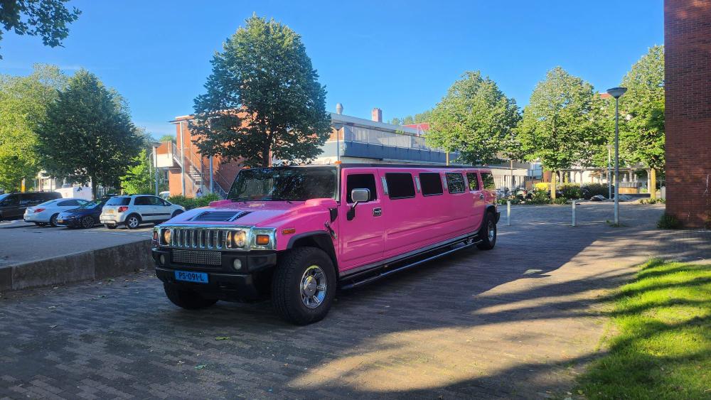 Hummer H2 limousine roze - Limousine Huren Den Bosch - Limousine huren Groningen