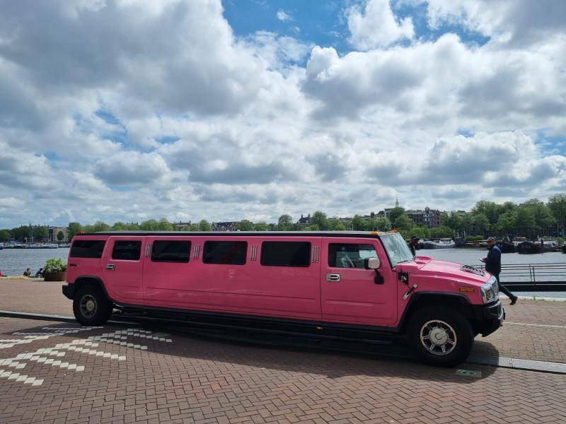 Hummer H2 limousine huren roze