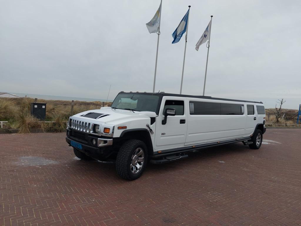 Hummer H2 limousine wit - Limousine huren Almere